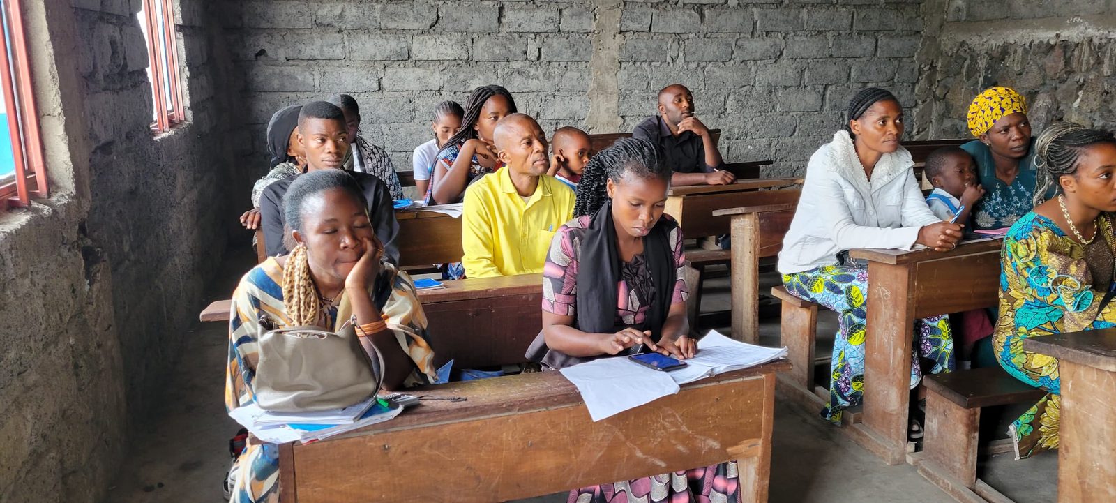 Participants prenant des notes pendant une séance de SAPI en RDC